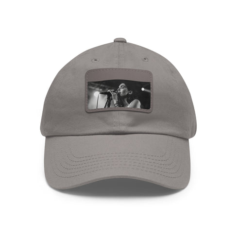 White cotton rectangle snapback with light brown patch inspired by Dua Lipa.