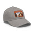 Moroccan-inspired baseball hat in white with light brown patch.