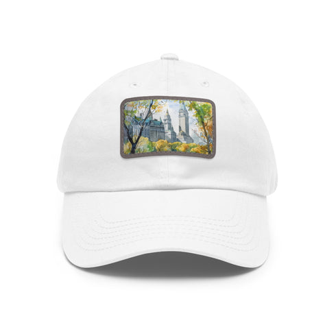 Central Park watercolor baseball cap in white with light brown patch.