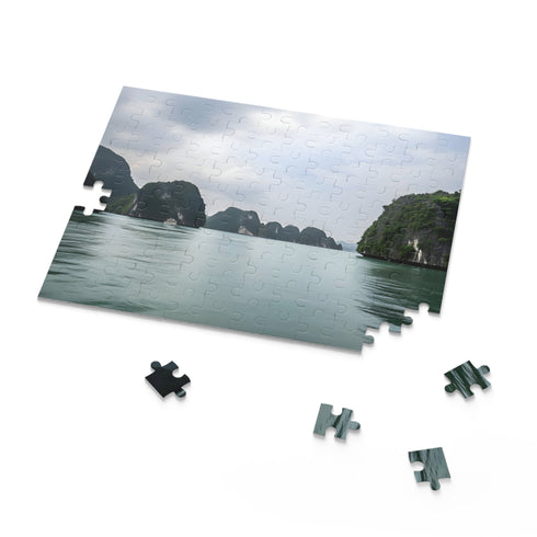 Jigsaw puzzle of Halong Bay limestone cliffs and emerald waters.