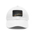 White cotton baseball cap with Lagos cityscape under starlit sky.