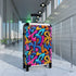 Bright neon graffiti suitcase set for stylish urban travelers.