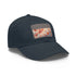 Autumn-themed white baseball hat with leaf pattern and rectangle patch.