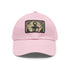 Nautical anchor baseball cap in white with light brown patch.