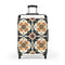 Artisan black ceramic tile patterned small suitcase for unique room transformation.