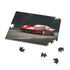 Ferrari racing jigsaw puzzle with high-speed image.