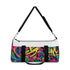Neon graffiti duffel bag with vibrant seamless pattern in multiple colors.