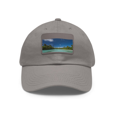White rectangular Aitutaki paradise cap with light brown patch.