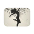 Dancing notes bath mat with elegant silhouette and musical cascade.