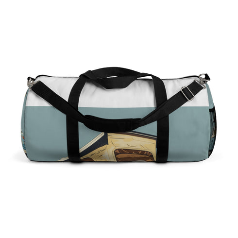 Light blue retro camper duffel bag for weekend getaways.