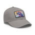 Watercolor unicorn baseball cap in white with light brown patch.