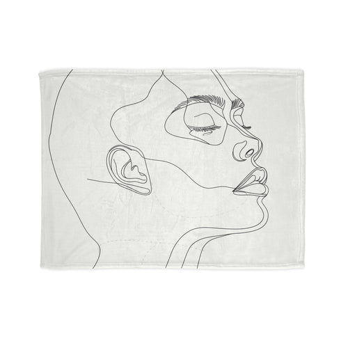 Minimalist line art visage design blanket for cozy Mother's Day gift.