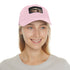 Monochrome Audrey Hepburn baseball cap with light brown patch.