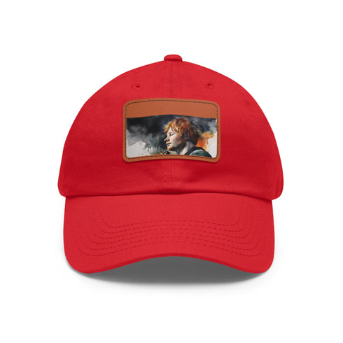 Ed Sheeran watercolor splatter baseball cap in white with light brown patch.