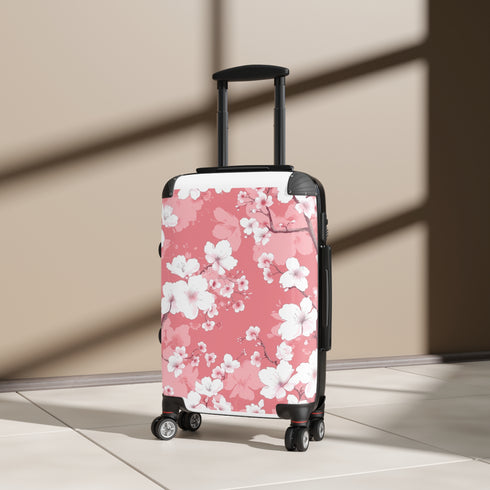 Cherry blossom small black travel bag with pink and white pattern.