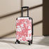 Cherry blossom small black travel bag with pink and white pattern.