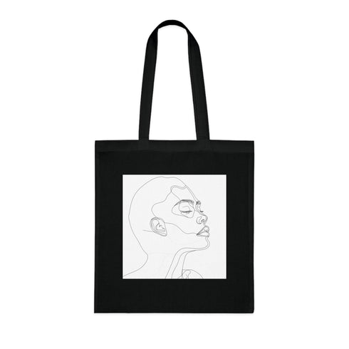 Minimalist black cotton tote bag with captivating line art visage.