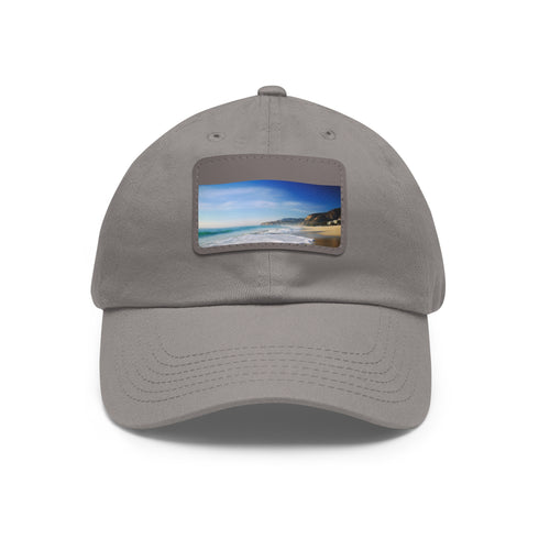 White cotton Malibu Dreamin unisex baseball cap with light brown patch.