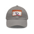 Dalmatian baseball cap with white and light brown patch.