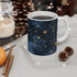 Blue ceramic coffee mug with starry night sky design.