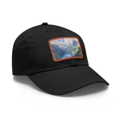 Swiss Alps watercolor baseball cap with light brown rectangle patch.