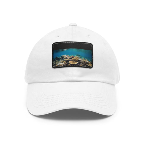 Great Barrier Reef baseball cap with coral reef design on white.