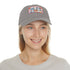 Floral baseball cap in white with light brown patch.