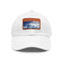 White baseball cap with light brown patch and breathable fabric.