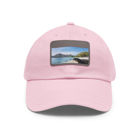 Komodo King white baseball cap with light brown rectangle patch.