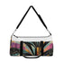 Colorful abstract deco duffel bag with geometric patterns, perfect for travel.