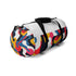 Vibrant geometric gym duffel bag with bold abstract print.