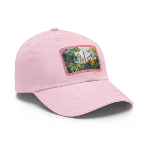 Central Park watercolor skyline baseball cap with white/light brown patch.