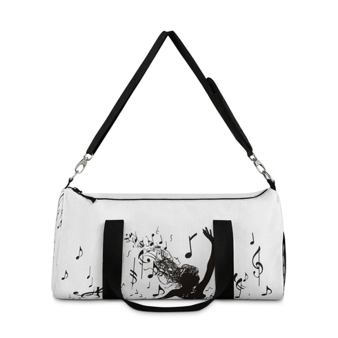 Stylish small duffel bag with dancer silhouette and musical notes.