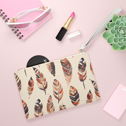 Boho Feathers Clutch Bag with intricate feather pattern, vegan material.