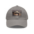 Audrey Hepburn monochrome baseball cap with light brown patch.
