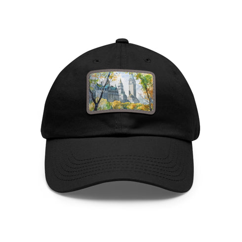 Central Park watercolor baseball cap with light brown patch.