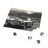 DB5 High Speed Jigsaw Puzzle featuring iconic Aston Martin on countryside.