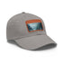 White cotton baseball cap with mystical horizon landscape design.