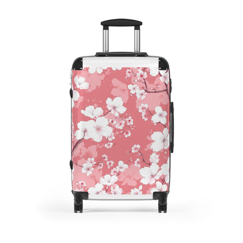Cherry blossom small black suitcase with pink and white pattern.