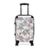 Chic pastel geometric small black suitcase for travel accessories.