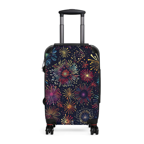 Bright black travel suitcase with festive fireworks pattern.