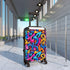 Vibrant neon urban graffiti suitcase set for stylish travelers.