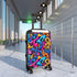 Vibrant neon graffiti suitcase set for stylish urban travelers.