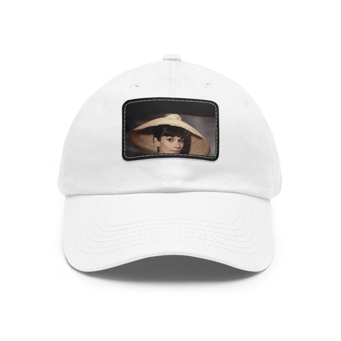 Iconic Audrey Hepburn monochrome cotton baseball cap with light brown patch.