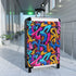 Neon graffiti patterned black suitcase set for travel accessories.
