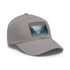 White baseball cap with mystic landscape design for adventurers.