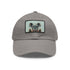White cotton baseball cap with cool cat patch for a trendy look.