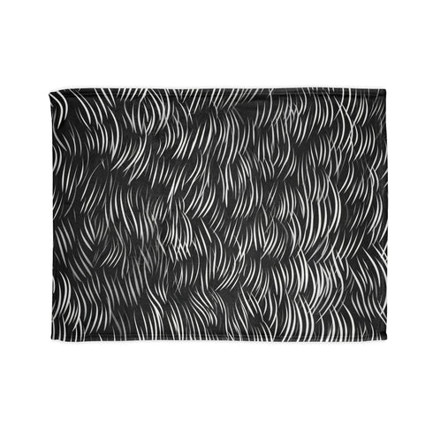 Artistic elegance Karastan Ink Dance Blanket, inspired by calligraphy strokes.