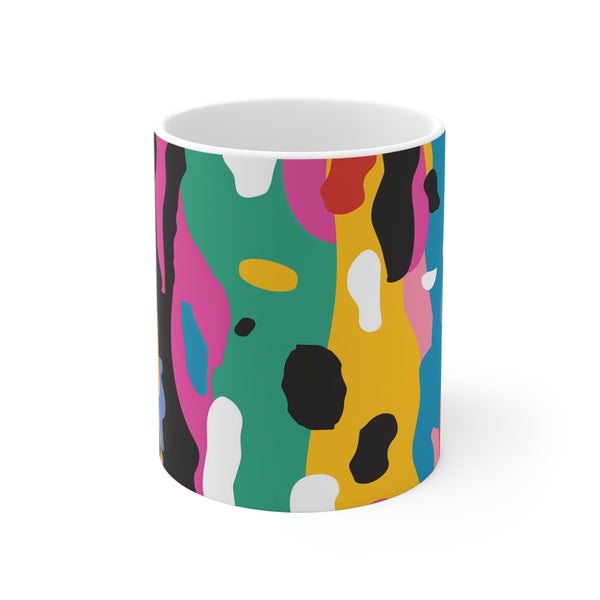 Abstract bright ceramic coffee mug with bold seamless pattern.