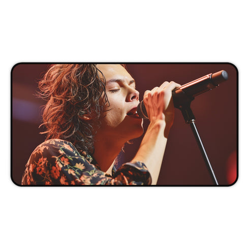 Harry Styles singing desk mat brings concert energy to workspace with vibrant illustration, surf on music wave